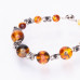 Браслет из янтаря, украшенный бисером