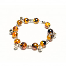 Изящный браслет из натурального янтаря с металлическими вставками