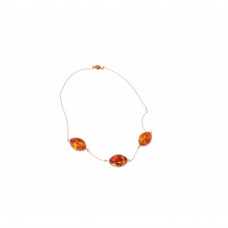 Колье из янтаря на цепочке из позолоченной латуни Колье из янтаря на цепочке из позолоченной латуни