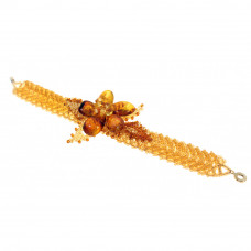 Красивый браслет с цветком из бисера и балтийского янтаря