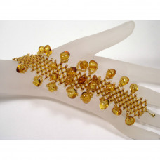 Плетеный браслет из бисера и балтийского янтаря