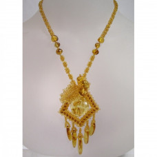 Плетеный кулон из балтийского янтаря с бисером