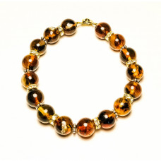 Роскошный браслет из балтийского янтаря с металлическими вставками